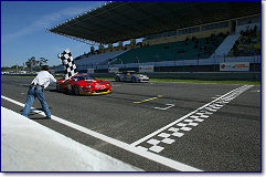 Fabio Babini, Ferrari 575 GTC s/n 2208 crosses finishing line to win