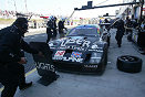 Laurence Pearce supervises the final Lister pit stop while in the lead..........a collision with the Alliot Viper lead to the exclusion of the Lister Storm