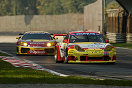 Emmanuel Collard (EMKA Racing Porsche 996 GT3-RS) leads Andrea  Bertolini early in the race