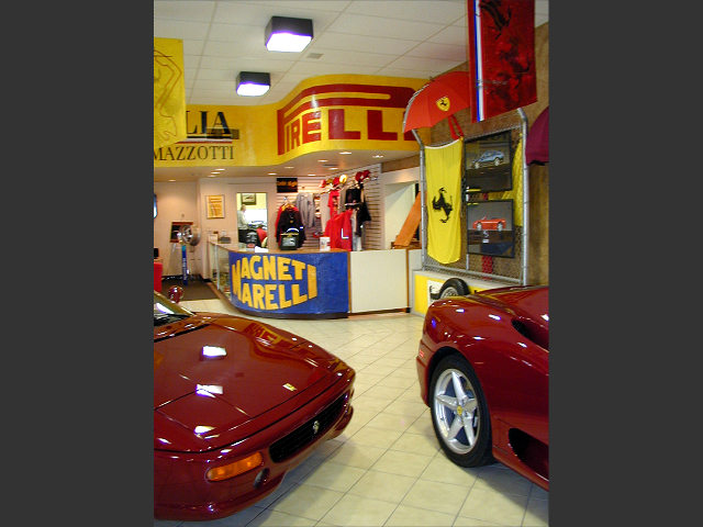 110765, in Rosso Barchetta with tan interior, together with a 360 Modena F1, 117381, in red with black interior