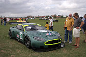Michael Fux & Derek Bell standing at Mr. Fux' Aston Martin DBR9 #DBR9/05