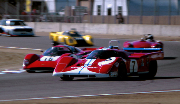 Tom Hollfelder in 512 "F" s/n 1048 leads a pack of cars into turn 4
