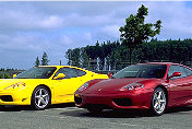 360 Modena F1 s/n 112896 (in "Rosso Fiorano") and 360 Modena s/n 112885 (in "Giallo Modena")