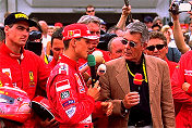  Michael Schumacher giving his comments about the 360 Modena Challenge to star-reporter and motorsport insider Rainer Braun