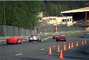 Ferrari and Maserati sports cars on Spa-Francorchamps' old finishing line