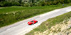 Italian cars at the road from Urbino to Gala del Furlo