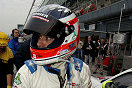 Stephane Ortelli exits the No50 Freisinger Porsche during morning warm-up