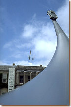 Enormous conical structure reaching skyward, atop which was perched a 300 SL ”Gullwing” coupe