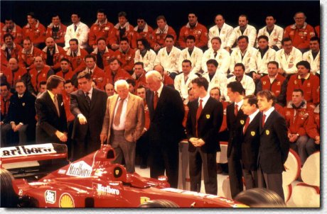 Behind the new Ferrari F399 from the leftLuca di Montezemolo, Paolo Cantarella, Giovanni Agnelli, Paolo Fresco, Eddie Irvine, Michael Schumacher, Jean Todt and Luca Badoer
