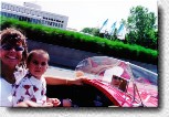 Cris enjoys the drive from Samocar in the city