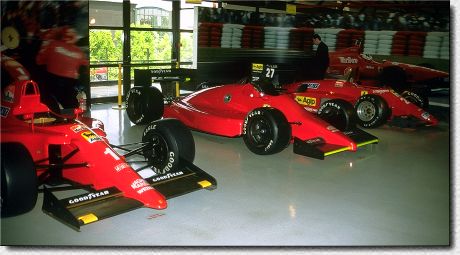 Formula One cars and Indy car prototype in center 