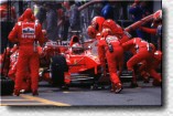 Michael Schumacher managed to get out of the pits right in front of his rivals Wurz and Frentzen, although he had stalled the engine during the pitstop.
