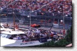 Michael Schumacher drives in the F300 s/n 184 alongside the harbour 
