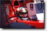 Michael Schumacher watching the monitor during qualifying 
