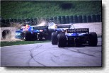 Trouble for Johnny Herbert in his Sauber and the two Minardi 