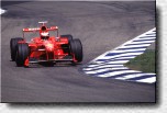 Michael Schumacher with the F300 s/n 186 in the Ostkurve 