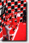 Michael Schumacher, David Coulthard and Jacques Villeneuve on the podium 