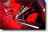 The Ferrari stand at the pit wall 