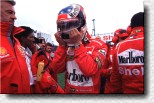 Michael Schumacher prepares himself for the race. His manager Willy Weber is on the left