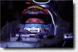 Hakkinen watches Schumacher on TV during qualifying. 
