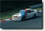 Nach 24 Stunden Fahrt durch die Eifel-W�lder konnte Emanuele Pirro seinen Sieg feiern. Den Schnitzer-M3 teilte er sich mit Roberto Ravaglia und Fabien Giroix.