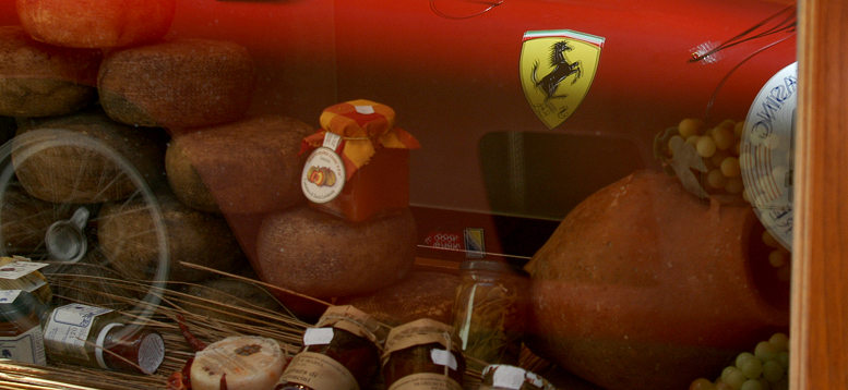 Cavallino reflections in a shop window