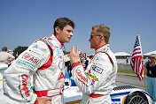 Johnny Herbert (right) gives pre-race advice to co-driver Pierre Kaffer