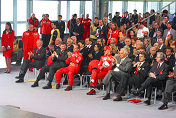 Rubens Barrichello, Michael Schumacher and Luca di Montezemolo in the front row