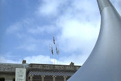 Enormous conical structure reaching skyward, atop which was perched a 300 SL Gullwing coupe