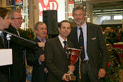 G&ouml;tz Seidel & Helmut Eberlein being handed over the prize for the official Ferrari Display