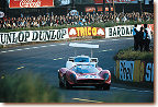 Le Mans 24 h 1967The 412 P (330 P3/4) s/n 0846 was driven by Chris Amon and Nino Vaccarella. In the picture, Vaccarella leads the Chaparral 2F of Jennings/ Johnson through Les Esses