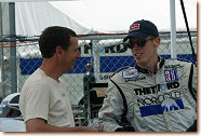 Dyson Racing teammates Butch Leitzinger (left) and Chris Dyson discuss Road Atlanta setups. Dyson set the fastest lap of the day in Tuesday's test session.
