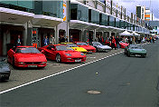 Lots of Ferrari parking in the pit Lane