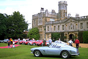 Ferrari parked in front of Castle Ashby