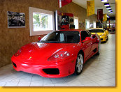 360 Modena F1 s/n 117381, in red with black interior, another with the F1 gear change s/n 116266, in yellow with black interior