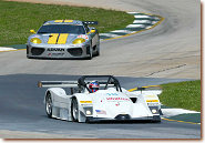 The Essex Racing Lola-Millington Prototype (front) leads the ACEMCO Ferrari 360 Modena through Road Atlanta's "S" turns during Tuesday's American Le Mans Series testing session.