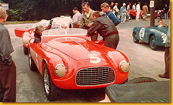 340 America s/n 0124A driven by Jim Kimberly.  Ed Lunken is on the left in the group behind the car.  He was driving the 166 behind Kimberly and bought the car from Jim.  The man in the leather jacket is Marshall Lewis.