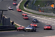 The pack stampeding uphill Eau Rouge