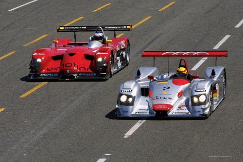 Frank Biela in the #2 Infineon Audi R8 battleing with the #51 Graf & Lagorce Panoz