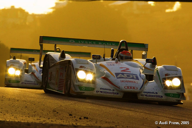 Emanuele Pirro in front of JJ Lehto