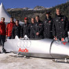 Four rings on four runners instead of four wheels: Mattias Ekstr&ouml;m, Martin Tomczyk, Christian Pescatori, Rinaldo Capello, Johnny Herbert, Tom Kristensen, Emanuele Pirro and Frank Biela (from left) with the Audi bobsled at the Olympic bob run in St. Moritz