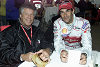 Racing legend Mario Andretti (left) with Audi driver Emanuele Pirro (right) at the 2001 Le Mans 24 Hour race