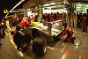 Pit stop for the Infineon Audi R8 (#2) at night