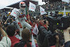 Audi driver Emanuele Pirro after crossing the finishing line with his Infineon Audi R8