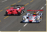 Frank Biela in the #2 Infineon Audi R8 battleing with the #51 Graf & Lagorce Panoz