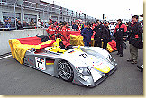 THe Audis on the grid, Reinhold Joest talking to engineer (red jacket)