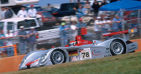 After taking the lead Tom Kristensen got hit in the back by the Magnussen Panoz and all the silk could not keep the demaged car in front